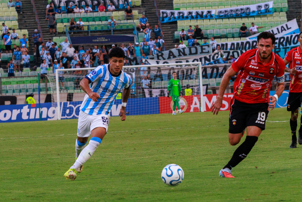 Racing visita a Caracas